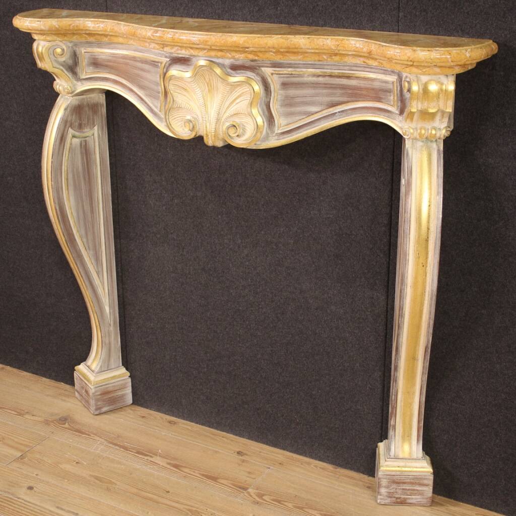 Scenic Italian painted and gilded wooden fireplace