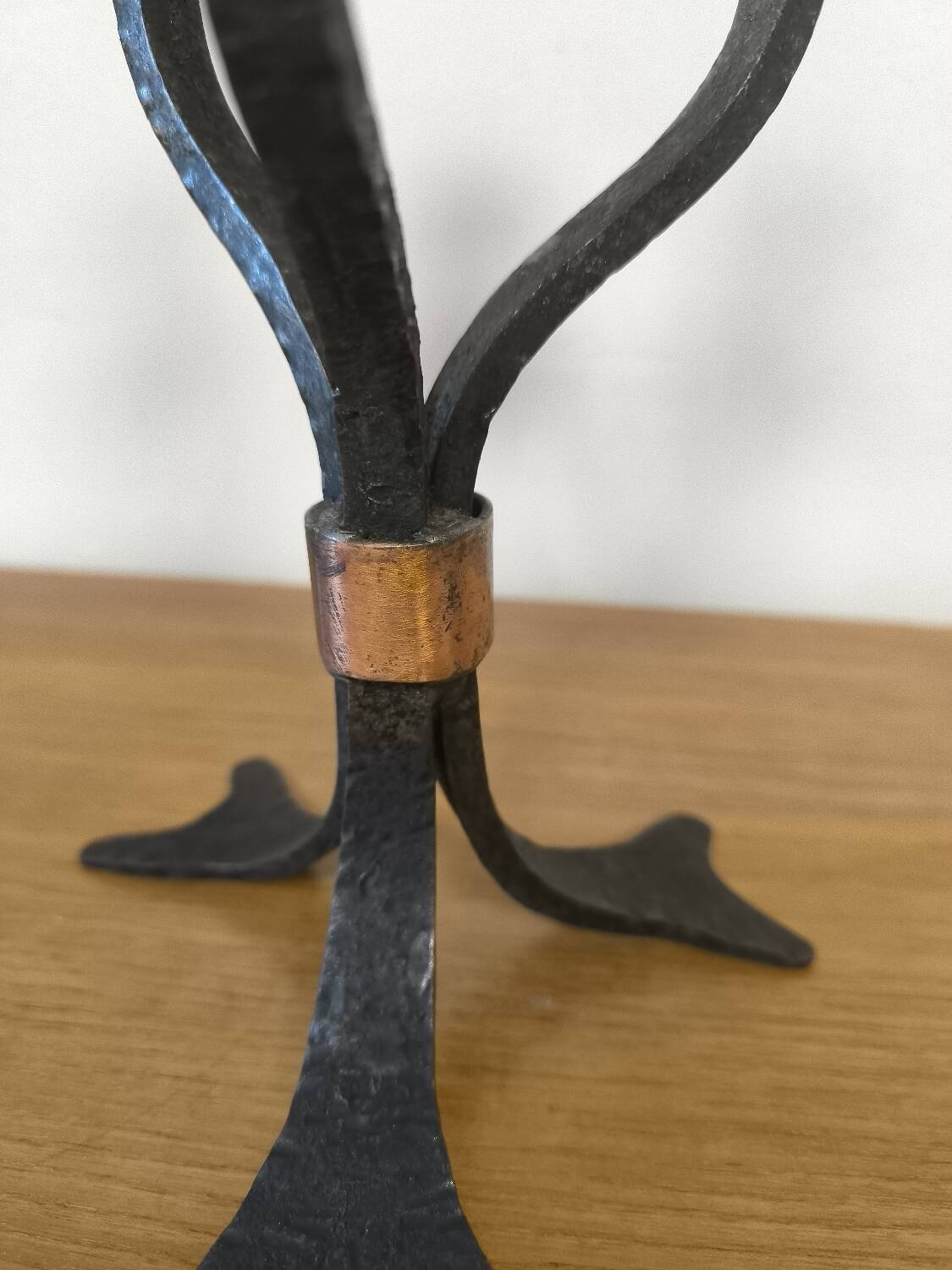Wrought iron and copper candlestick