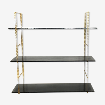 String gold metal shelf and black wood