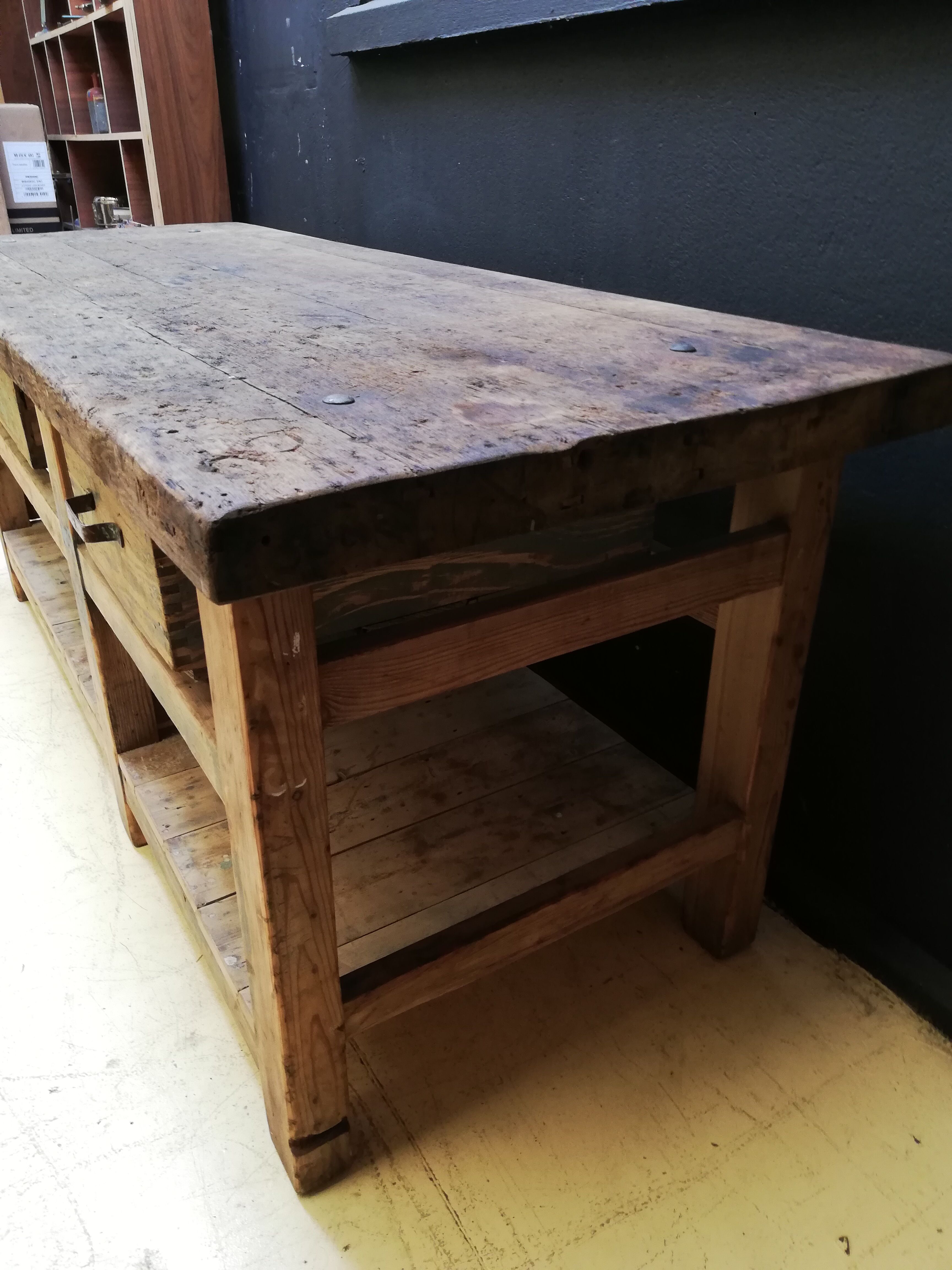 Old vintage wooden carpenter's workbench, industrial decoration