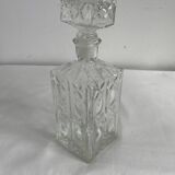 Molded glass carafe, 1960s-1970s, stylized flower decoration, oval, square base, stopper, rosette