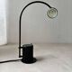 Minimalist Memphis design arc table lamp from the 80s.