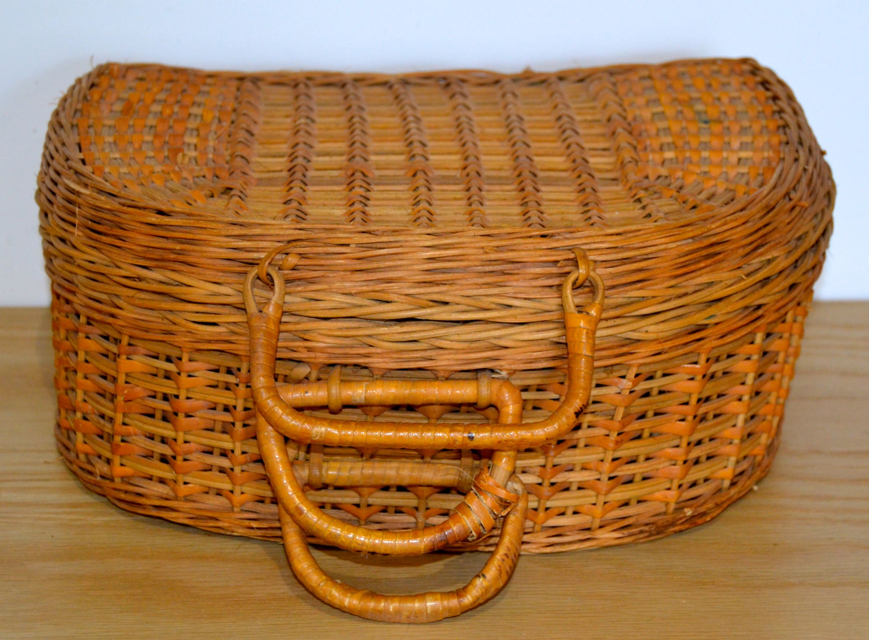 Half-moon rattan & wicker suitcase