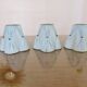 Set of 3 pale blue plastic strip lampshades, to clip onto a bulb.