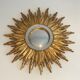 Sun mirror in golden resin 50cm
