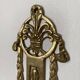 Brass coat hooks in the Napoleon III style.