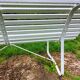 Antique garden bench with metal legs