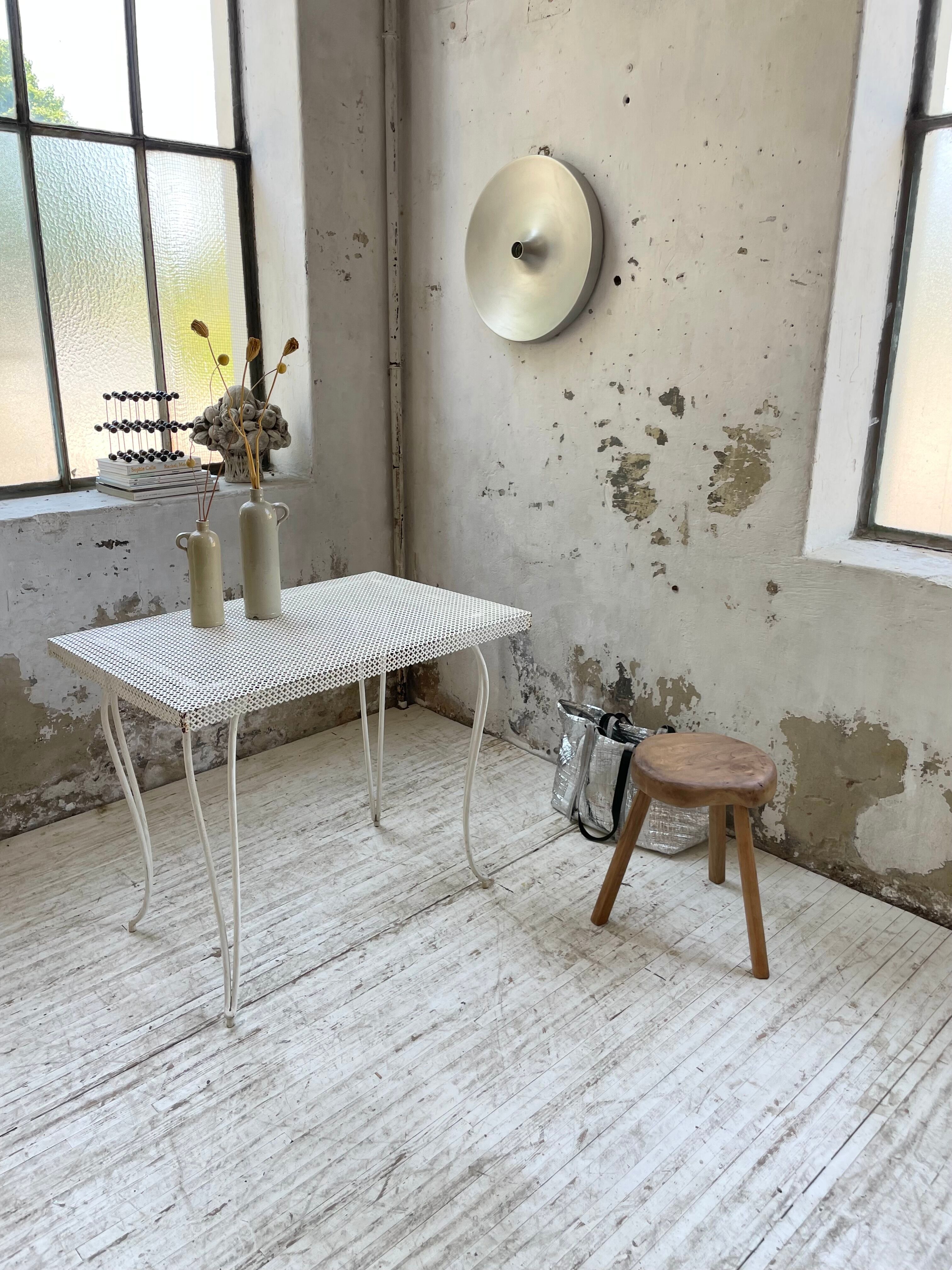 Perforated garden dining table