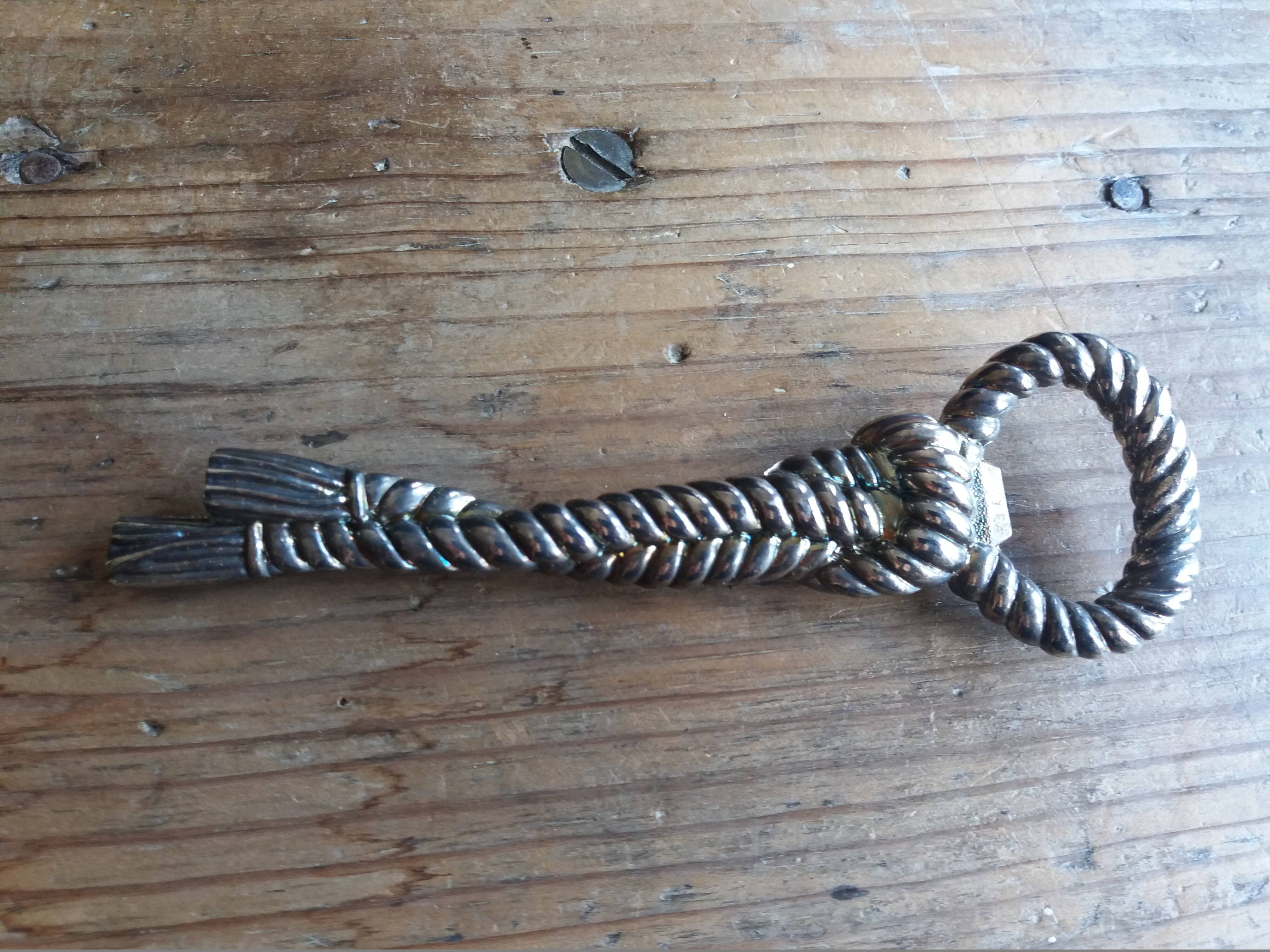 Silver metal rope bottle opener