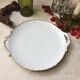Plat rond ancien de couleur blanc et or blanc avec anses made in france Limoges
