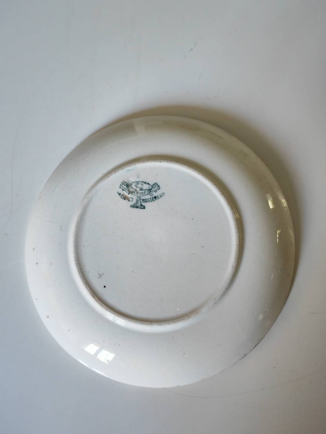 Soucoupe en terre de fer polychrome