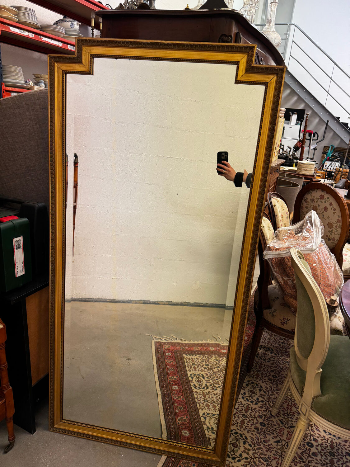 Large gold mirror in the Louis XVI style