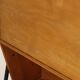Vintage 1960s wooden secretary with metal legs.
