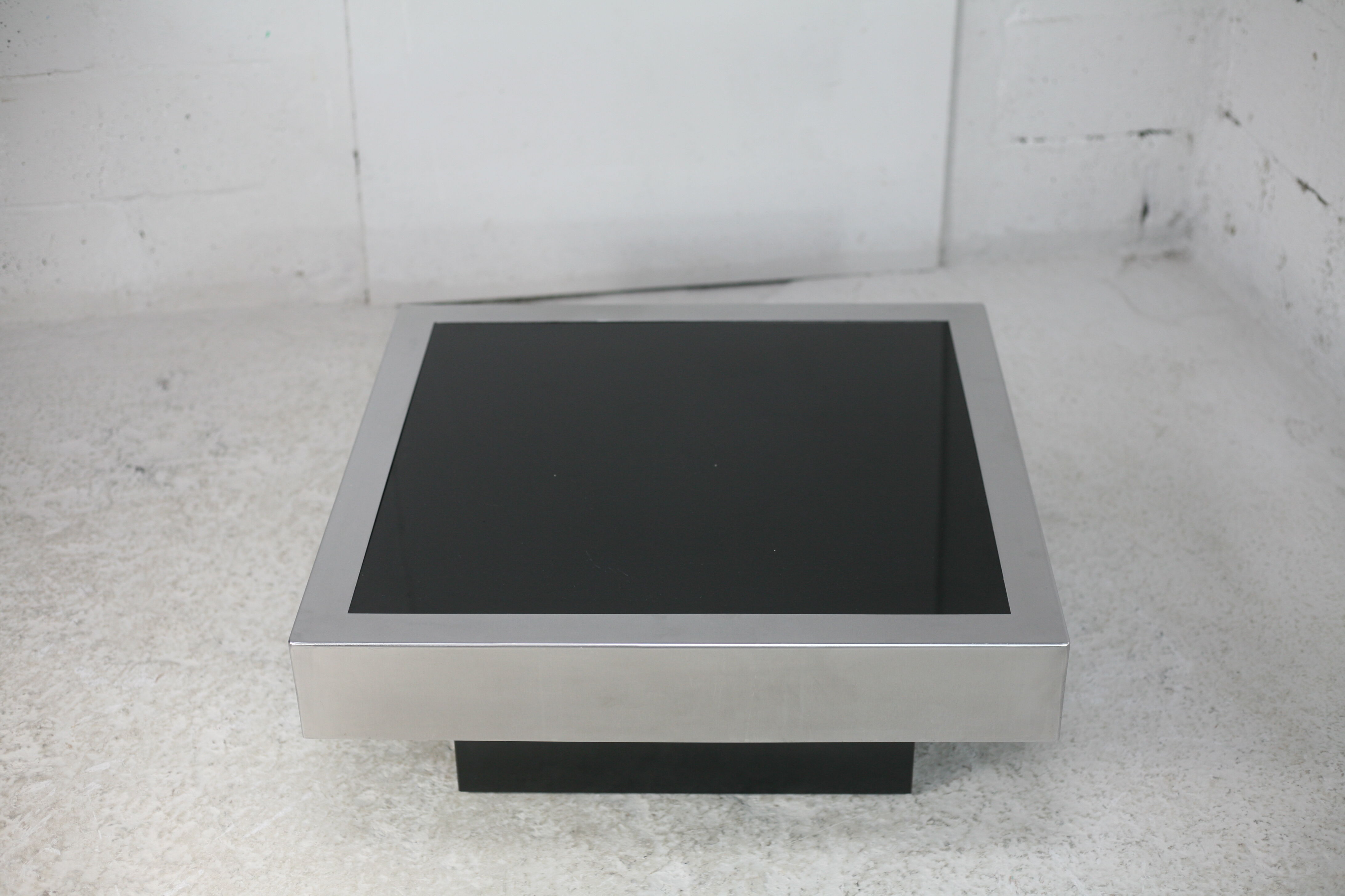 Coffee table in steel and black glass. France, circa 1970