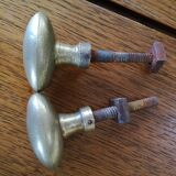 pair of old brass button handles