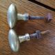 pair of old brass button handles