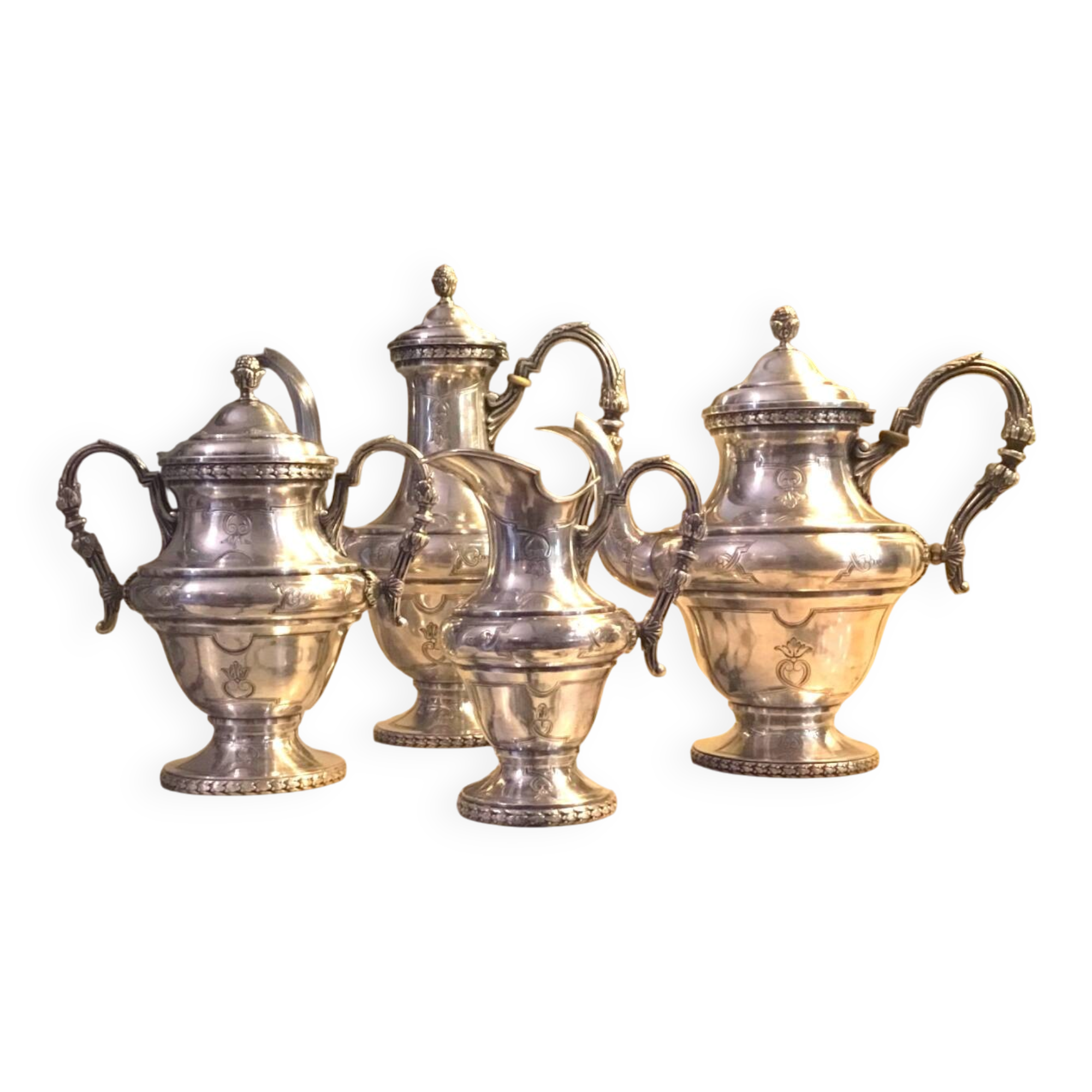 Silver-plated metal tea and coffee service in a 4-piece style.
