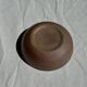 A speckled grey interior bowl with a matte brown exterior H5 D15