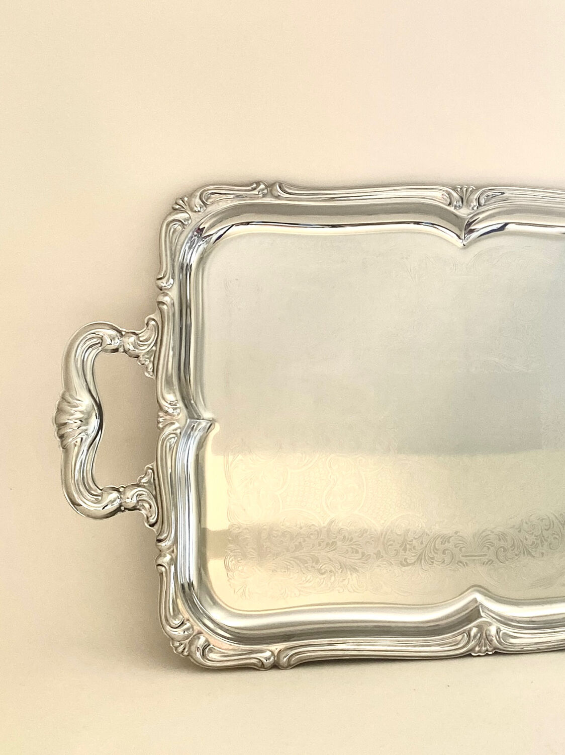 Baroque stainless steel tray Alessi