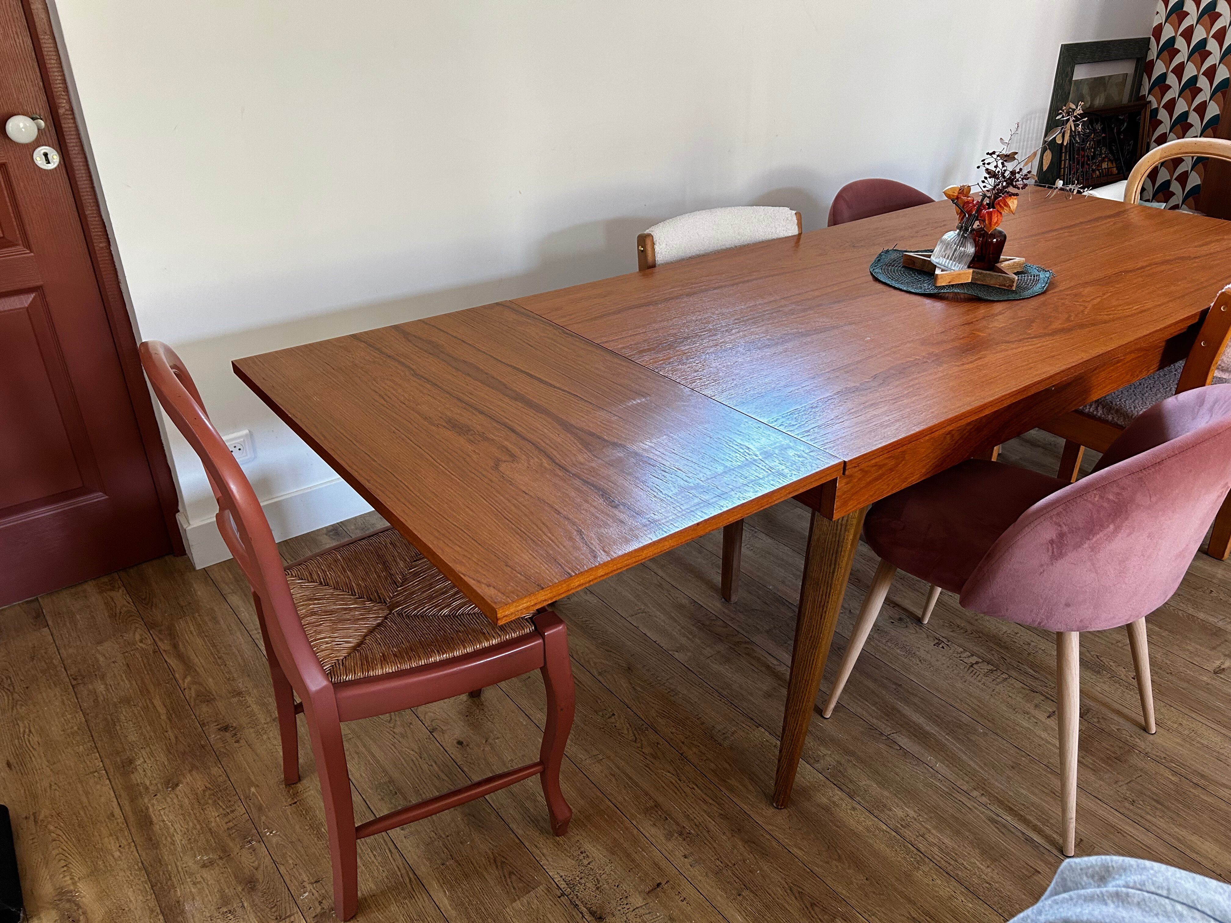 Vintage table with tapered legs.