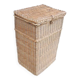 Old rectangular laundry basket in light wicker
