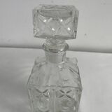 Molded glass carafe, 1960s-1970s, stylized flower decoration, oval, square base, stopper, rosette
