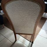 Renovated Voltaire armchair with boucle fabric.