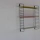 Minimalistic fifties metal metal wall system for Tomado Holland