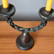 Sculpted wooden and wrought iron brutalist double chandelier from the 1960s.