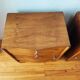 Pair of Art Deco curved bedside tables in light wood.
