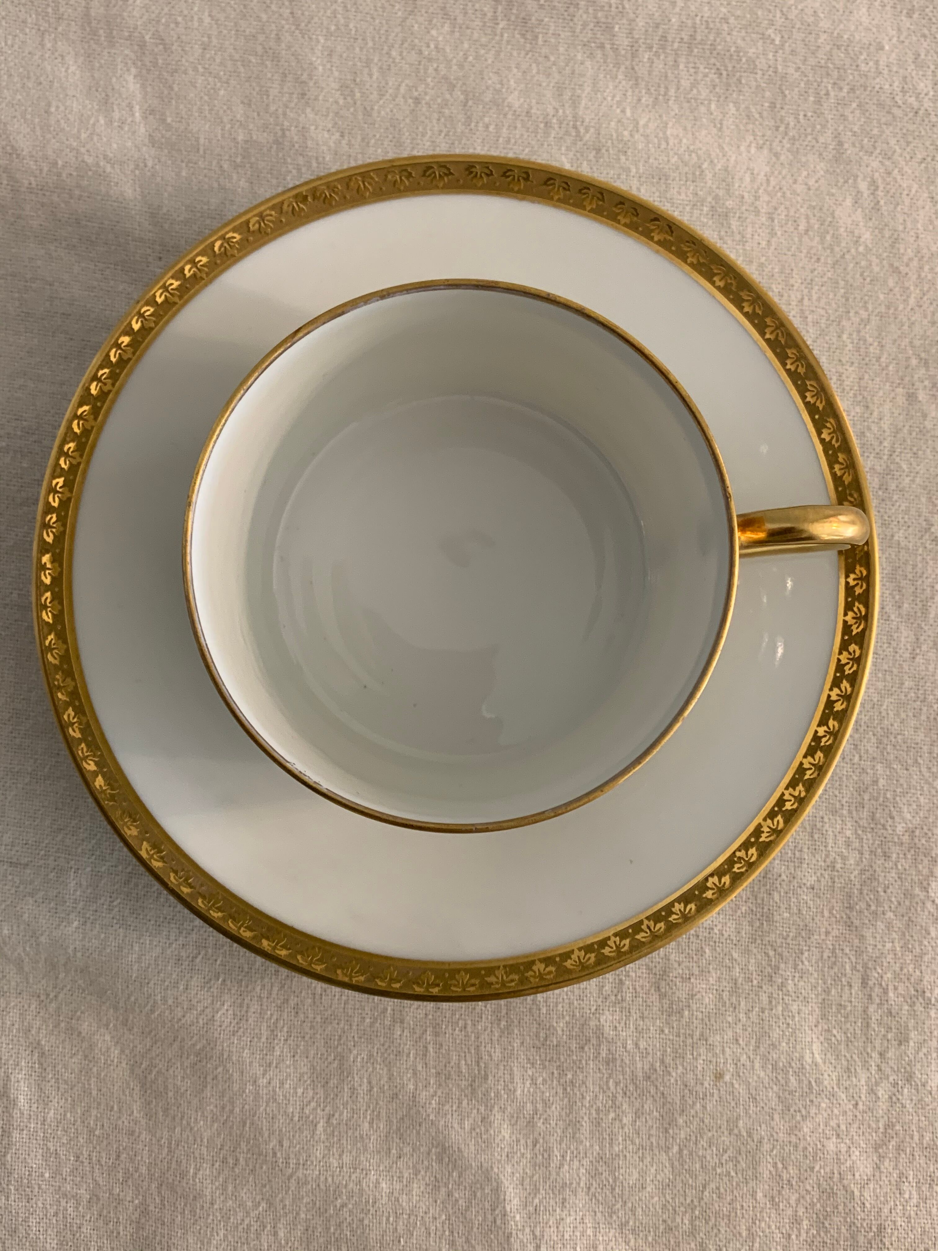 12 coffee cups and 12 white porcelain cups of Gold Gold Limoges