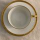 12 coffee cups and 12 white porcelain cups of Gold Gold Limoges