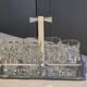 Baccarat 7 crystal liqueur glasses signed Model Harcourt on a stand.