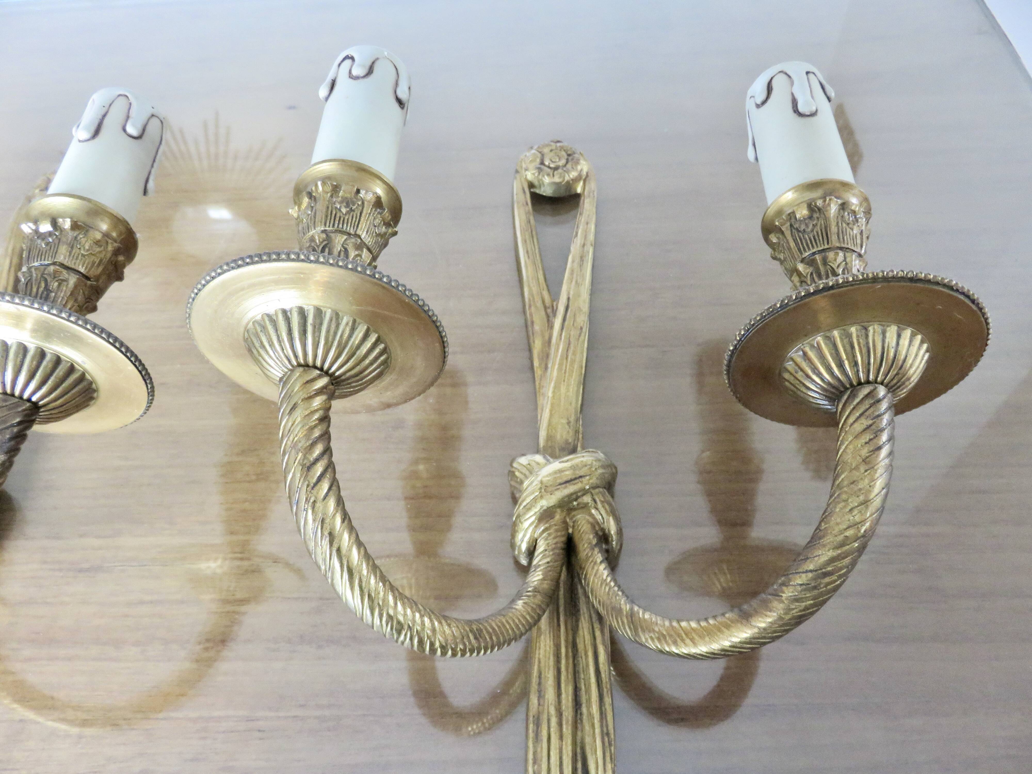 Pair of bronze wall lights, knots and tassels, Peris Andreu edition, 1970
