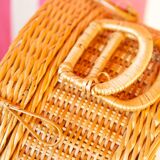 Round wicker suitcase