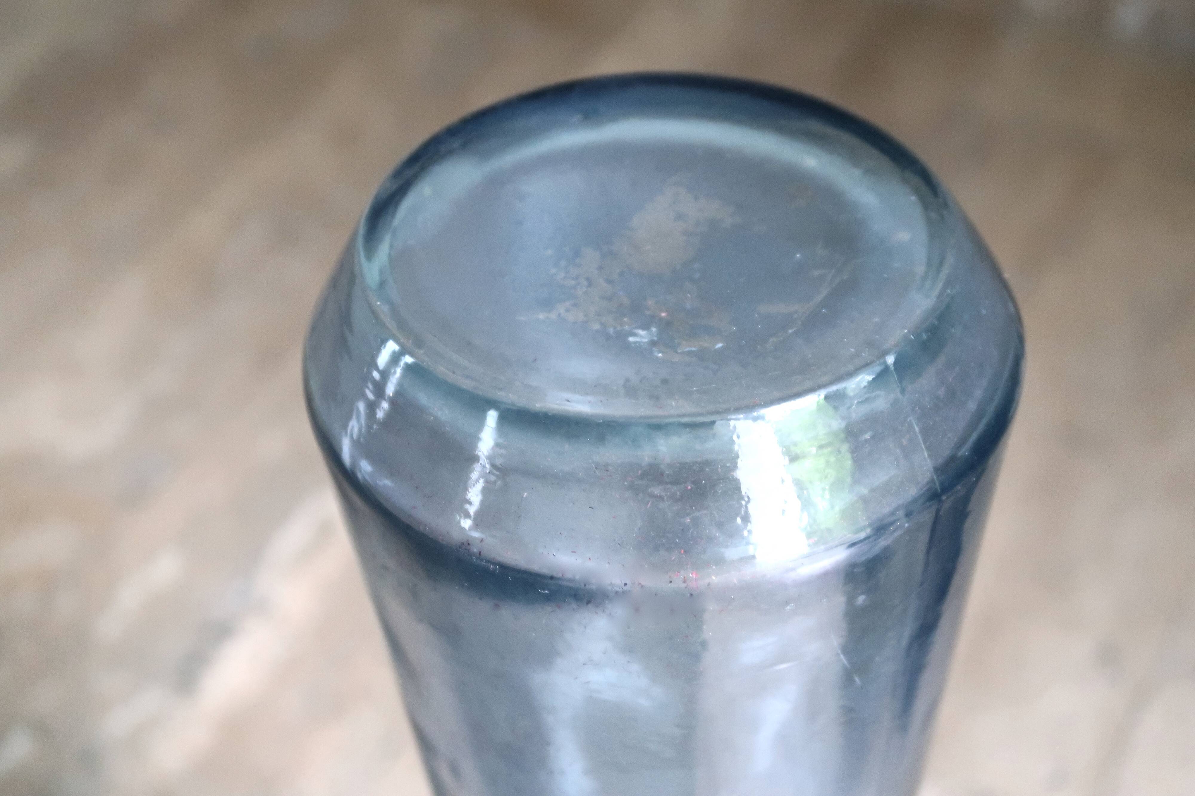 Blue glass bottle, 60s