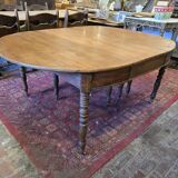 12-foot round oak table with 7 extensions / 20 people