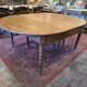 12-foot round oak table with 7 extensions / 20 people