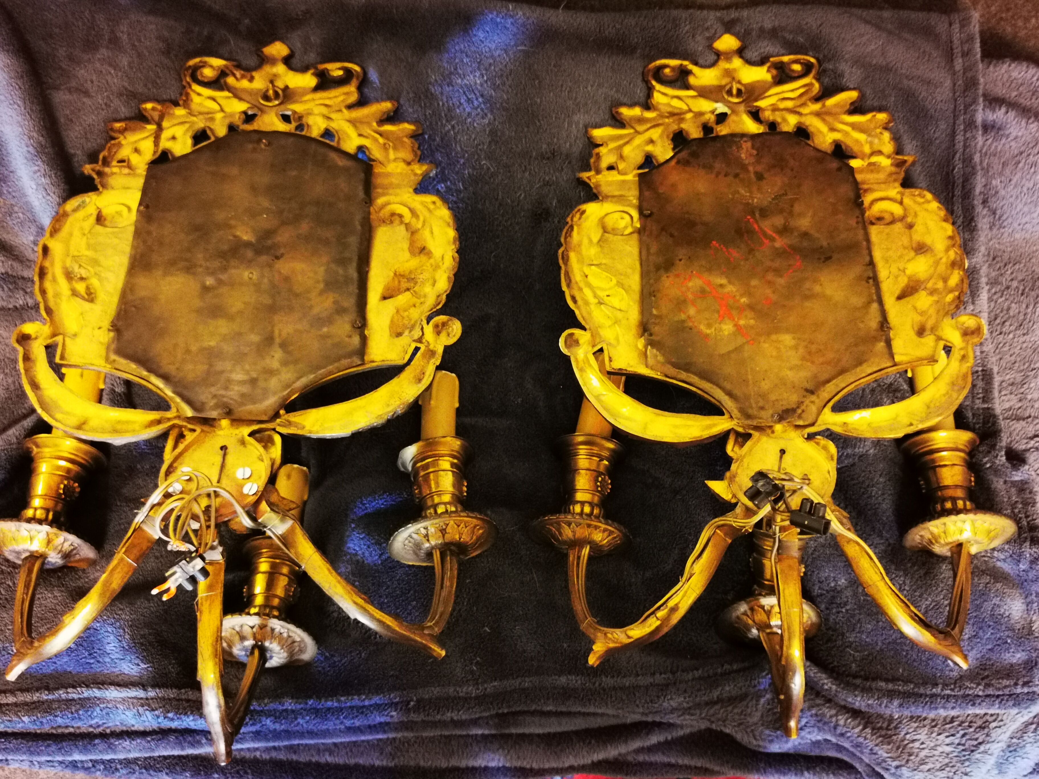 Pair of chissed and gilded bronze mirrors forming appliques