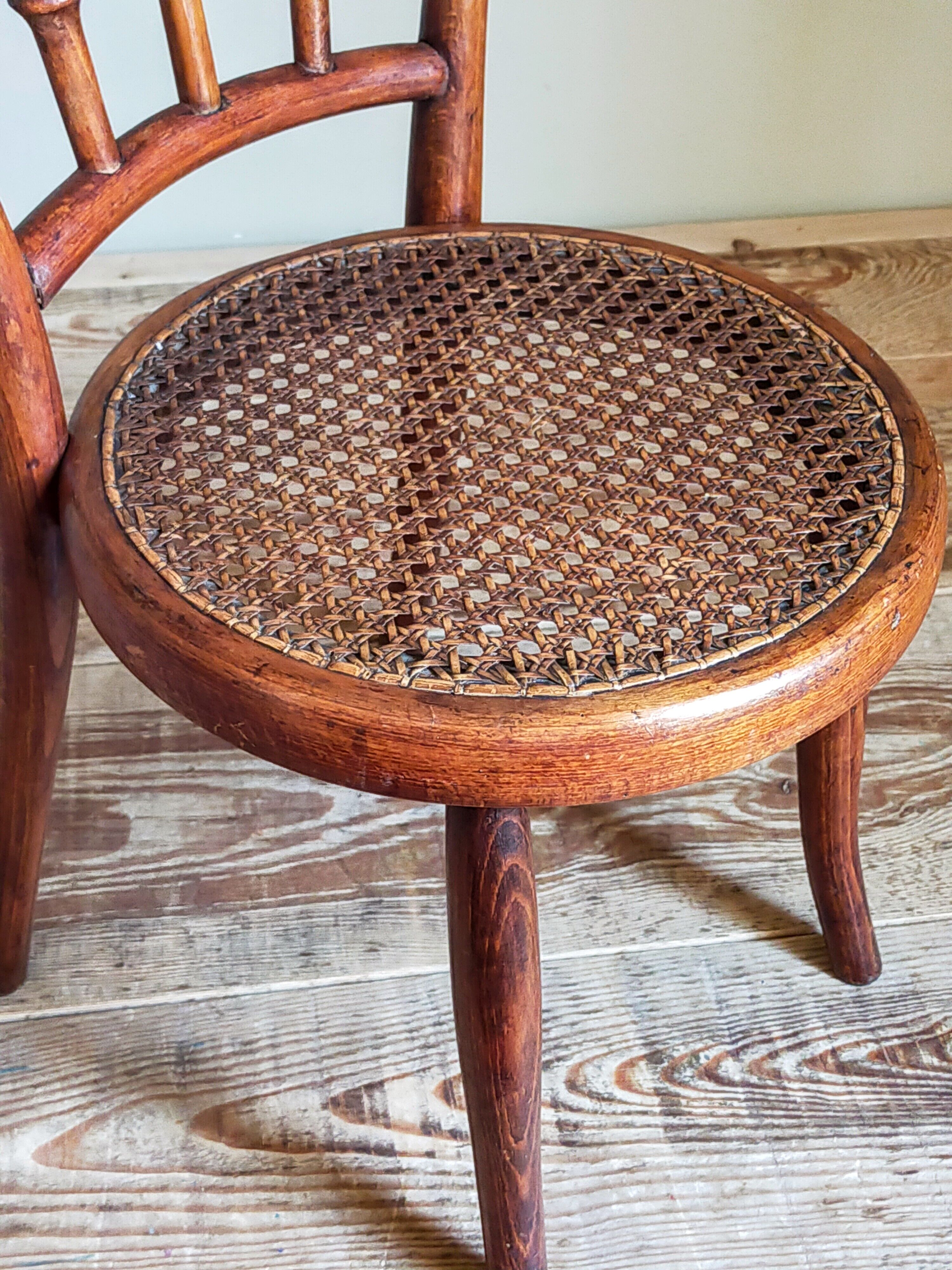 Children's chair in curved round wood old year