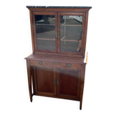 Victorian English two-body buffet with cherry wood on marble display case from the 19th century.