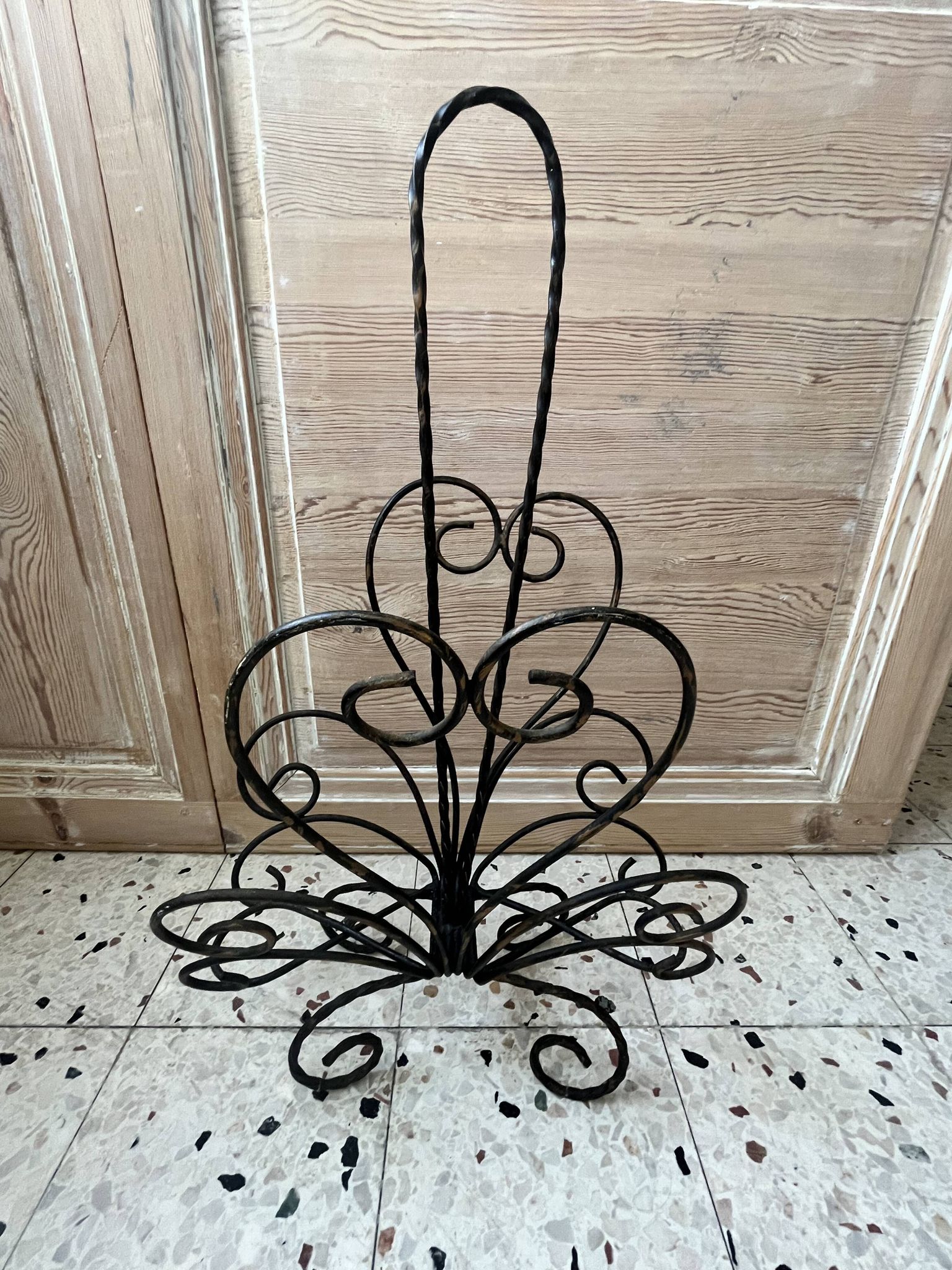 Wrought iron magazine rack
