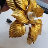 Golden metal flower sconce