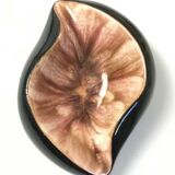 Empty pocket or ceramic ashtray in the shape of a shell