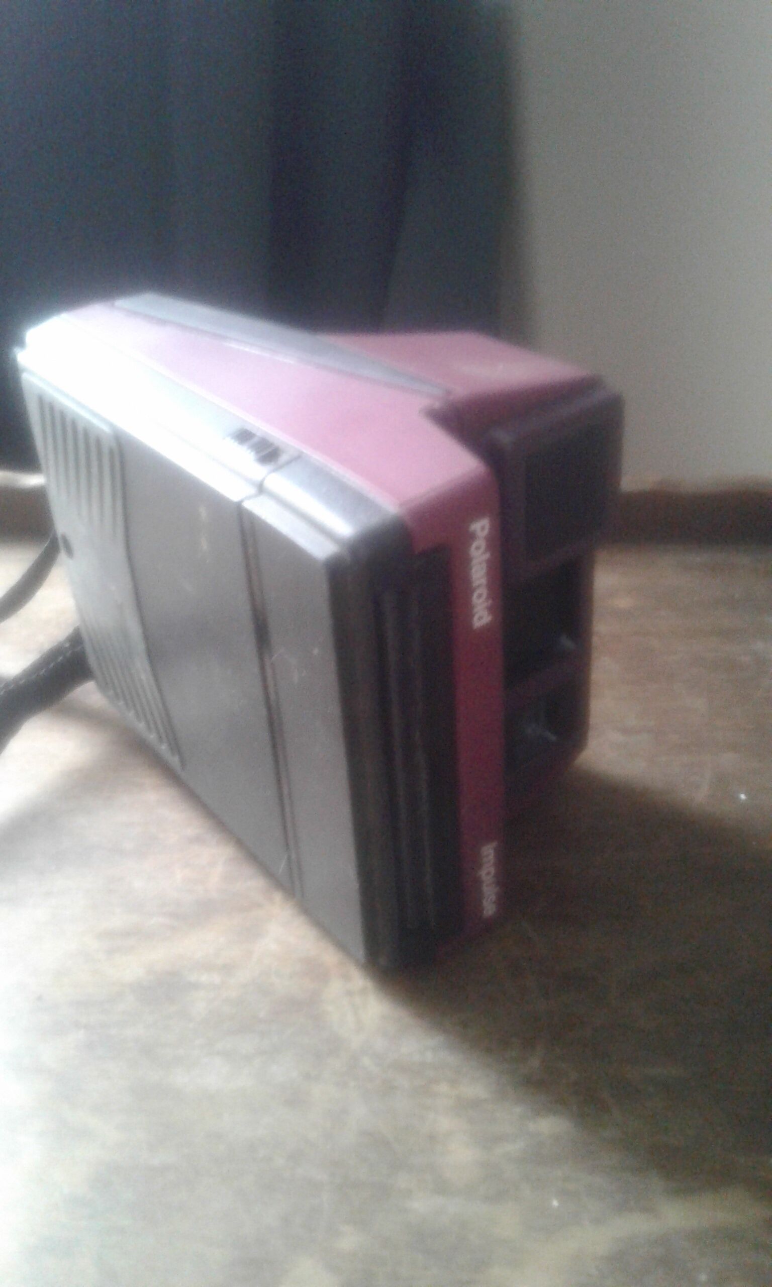 Instant impulse polaroid camera