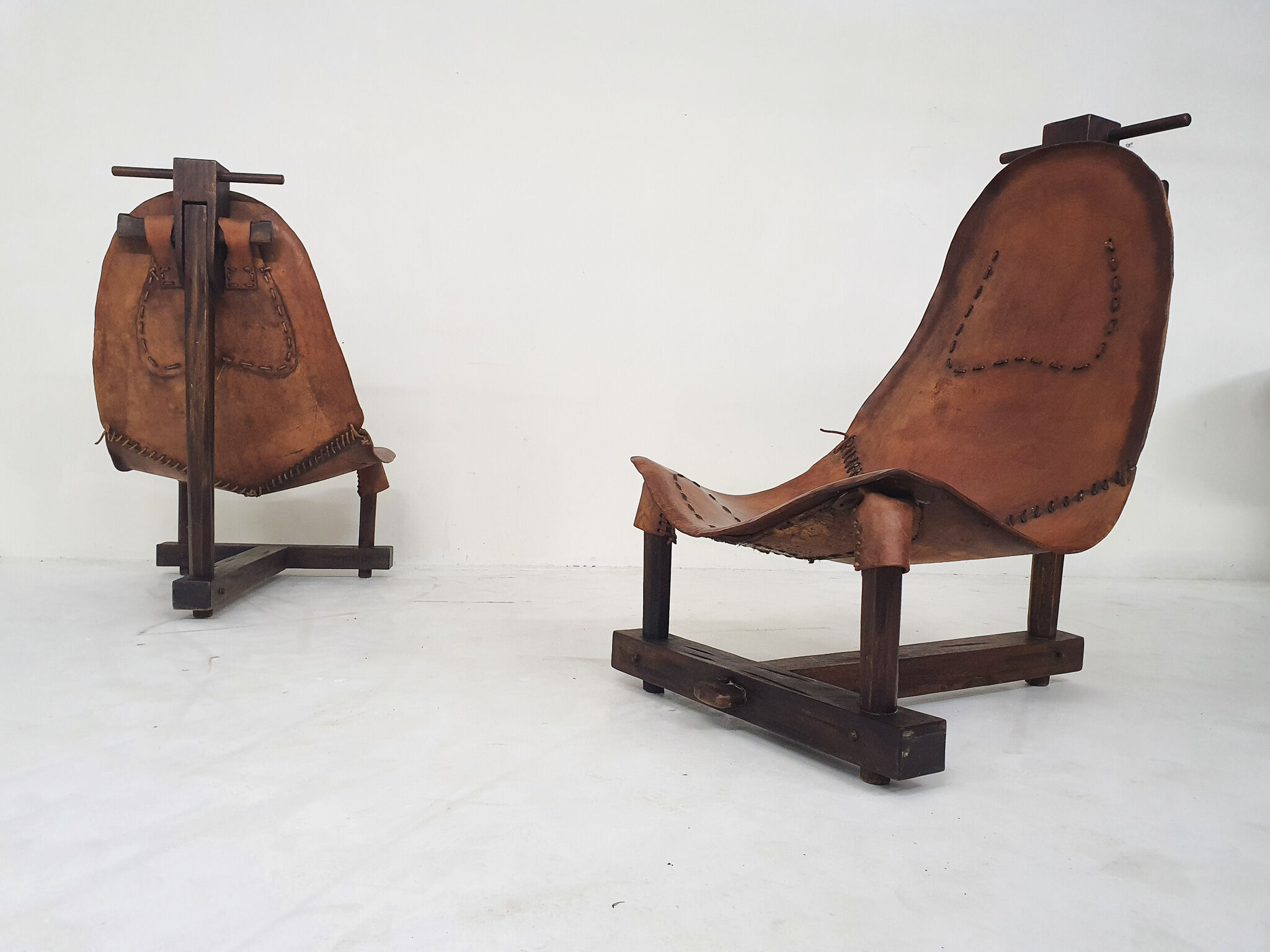 Set of two saddle leather lounge chairs, Brazil, 1960's