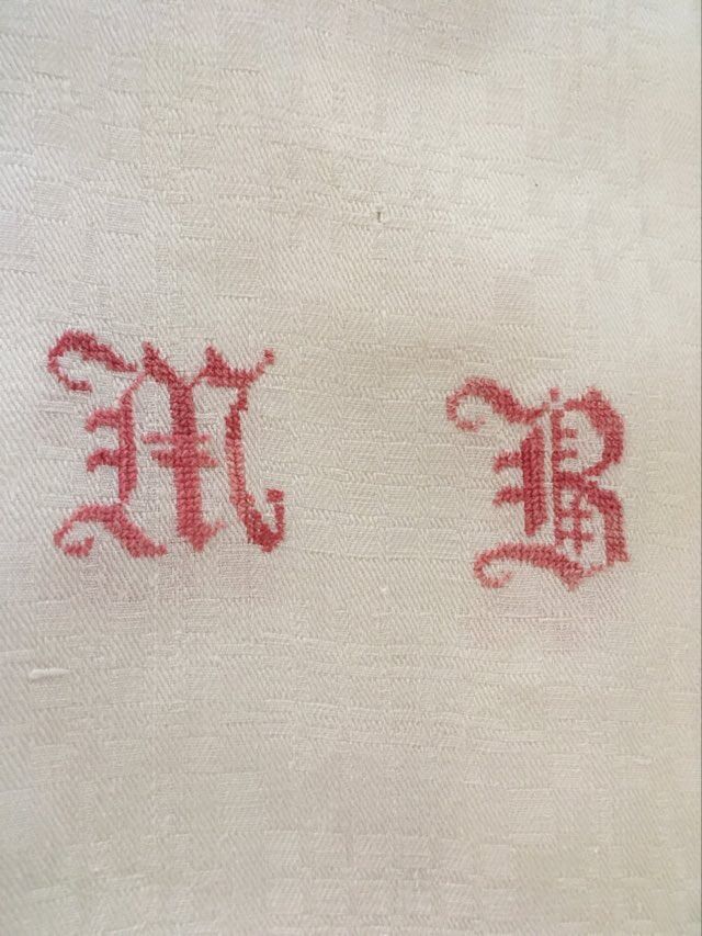 Damask tablecloth with double monogram M B.