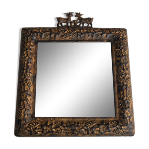 Miroir en métal décor ethnique,