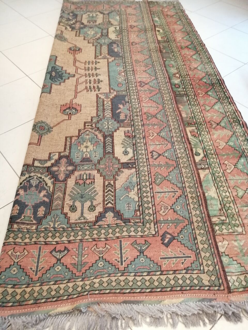 Afghan rug in pastel colors
