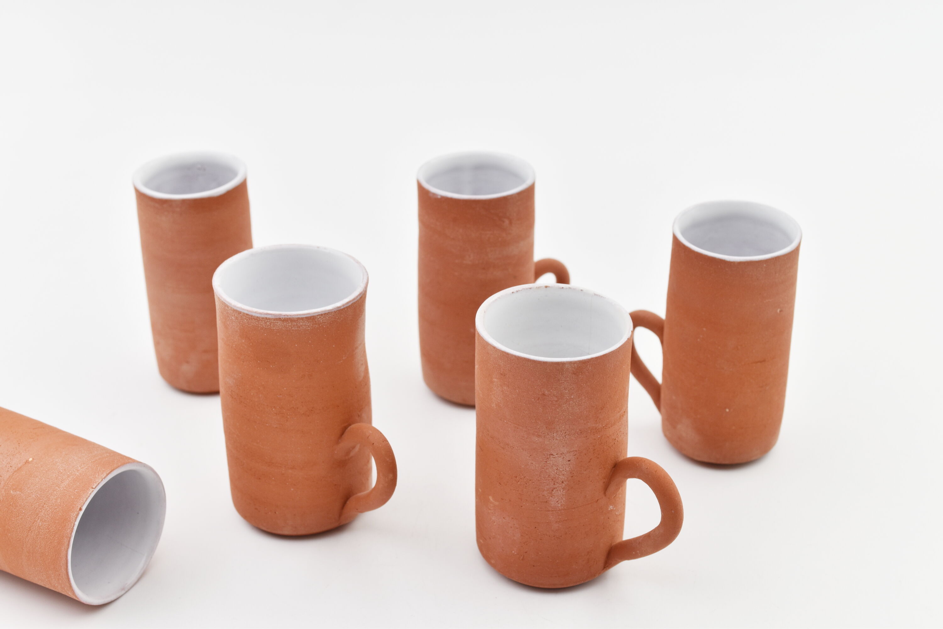Series of six terracotta cups